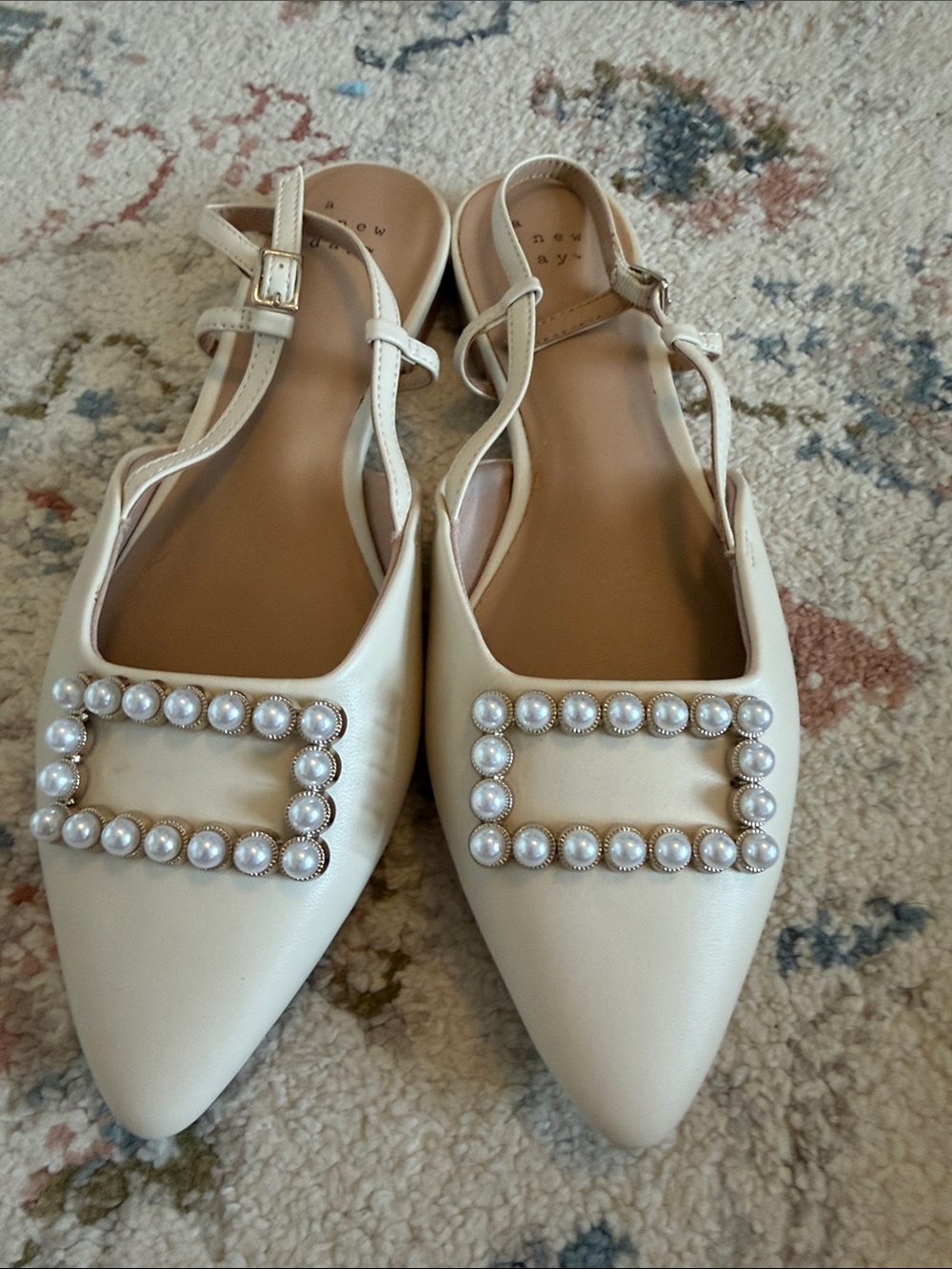 Pearl-Buckle Cream Pointed Slingback Mules